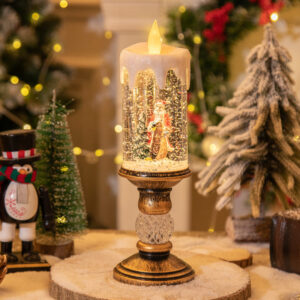 Flameless LED candle lantern with a Christmas snow globe scene inside