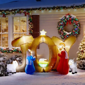 Inflatable nativity scene with a JOY sign, lit from within