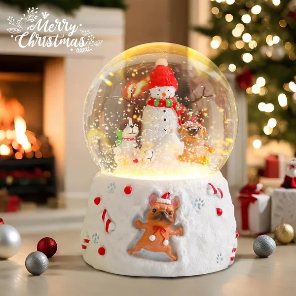 Musical Christmas snow globe with a snowman and puppies inside, view 2