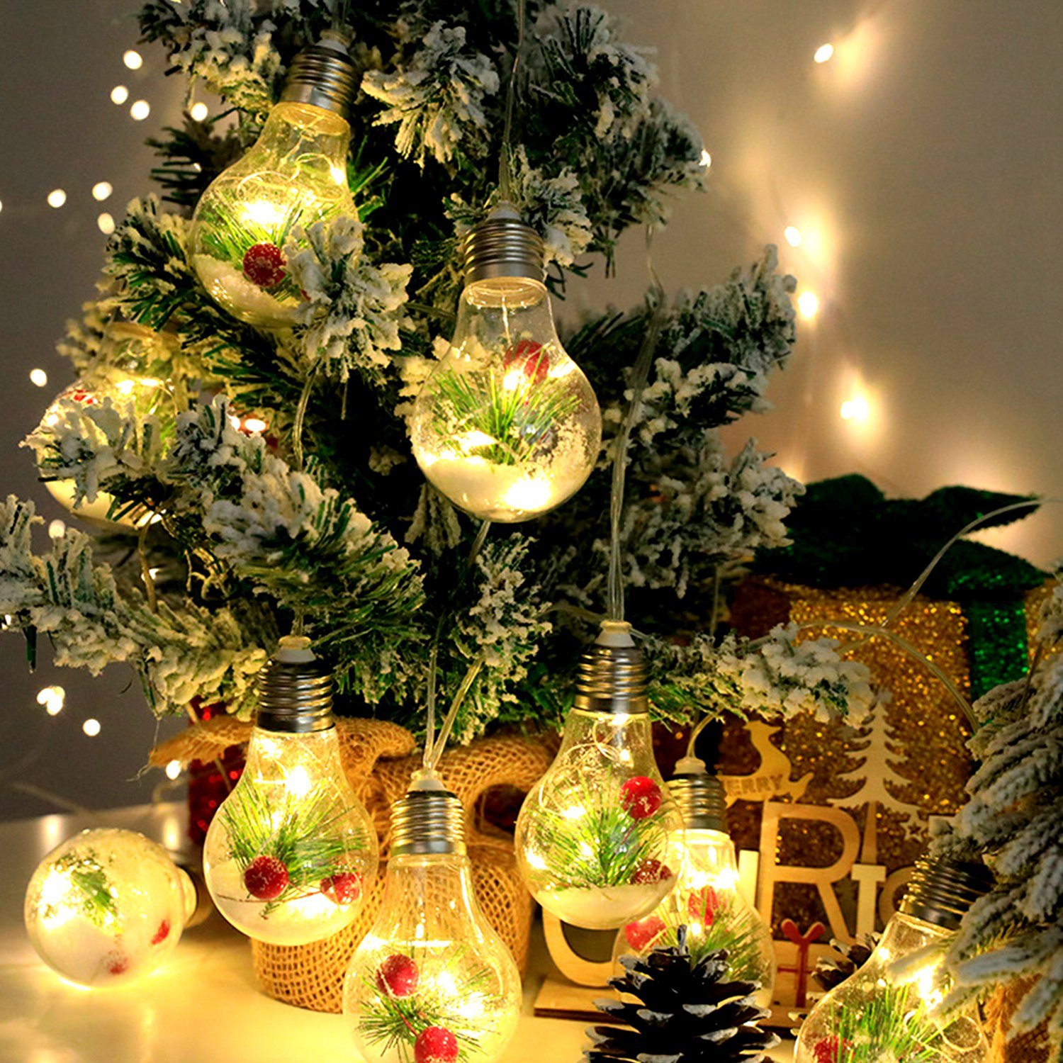 Battery powered string lights with ten small snow globes along the strand, view 4