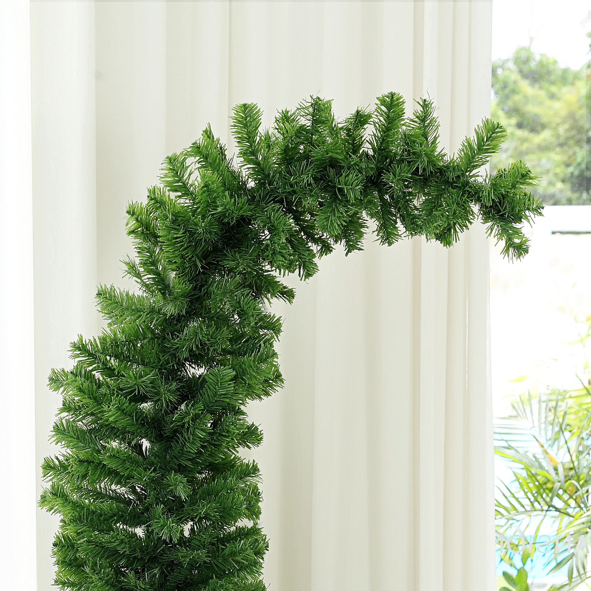 Whimsical pencil Christmas tree with a curled bending top, view 2