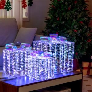 Three stackable lighted gift boxes finished with bows