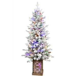 Pre lit flocked porch Christmas tree in a rustic wooden planter