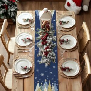 Navy blue Christmas table runner printed with trees and snowflakes