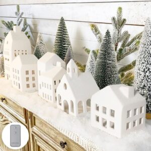 Lighted ceramic Christmas village with houses, trees and LED tea lights