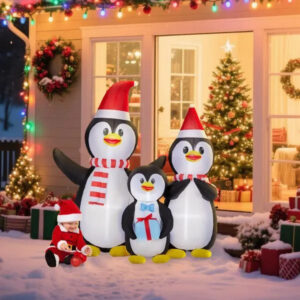 Inflatable penguin family yard decoration lit from within