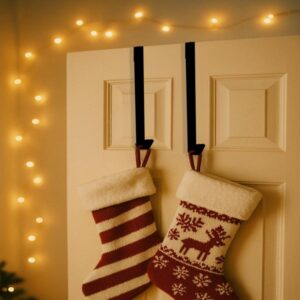 Black metal over the door hanger for a wreath and stockings