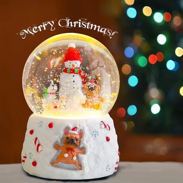 Musical Christmas snow globe with a snowman and puppies inside, view 3