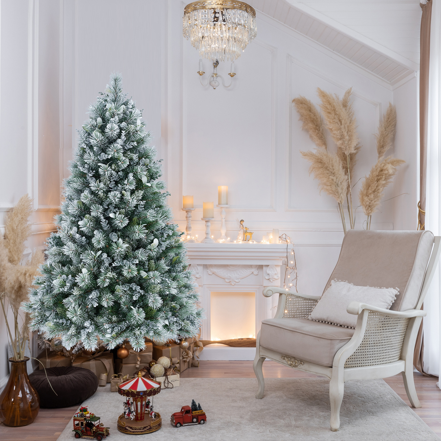 Snow flocked artificial Christmas tree with hard needle tips